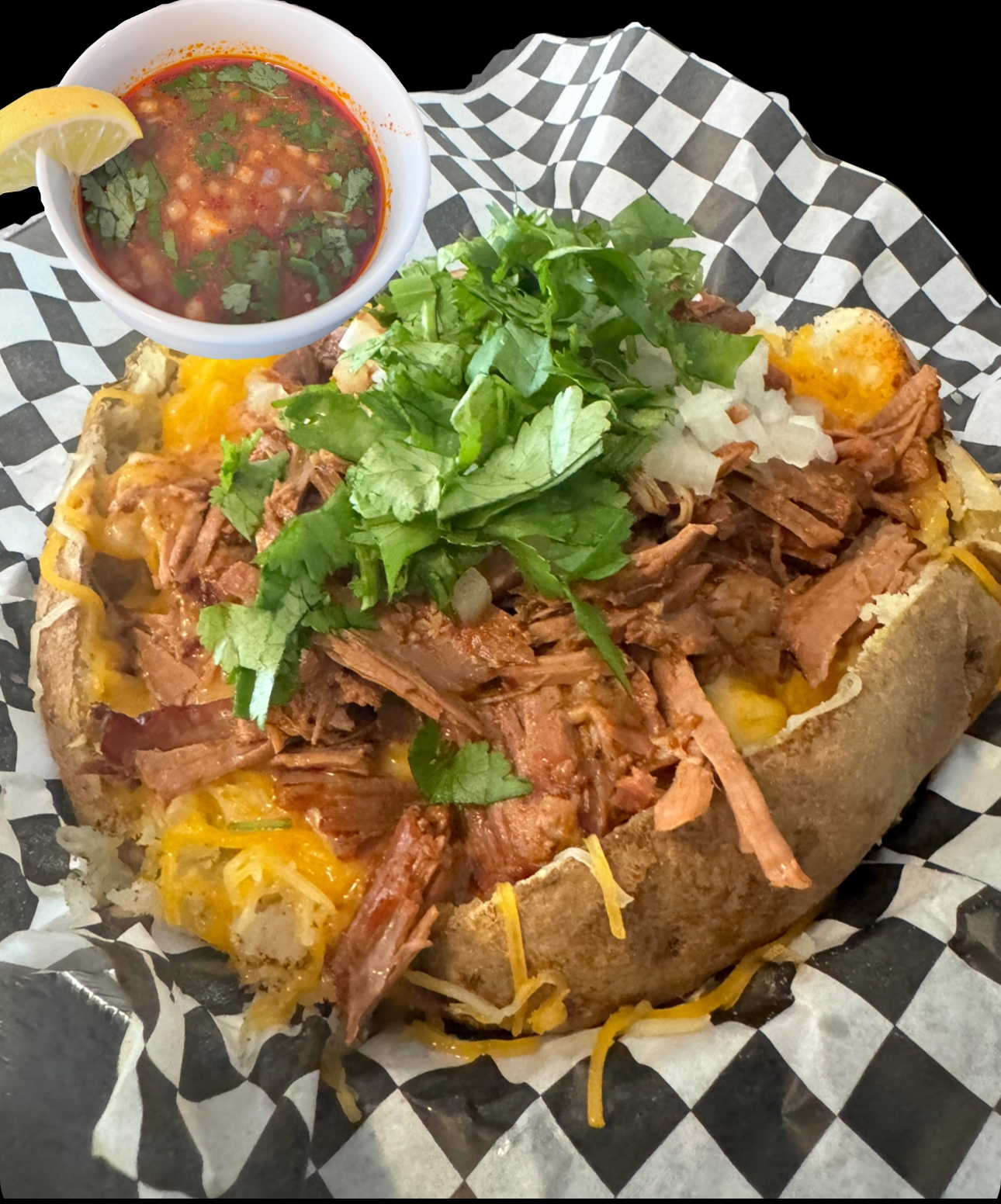 Placeholder photo of a loaded potato with extra toppings