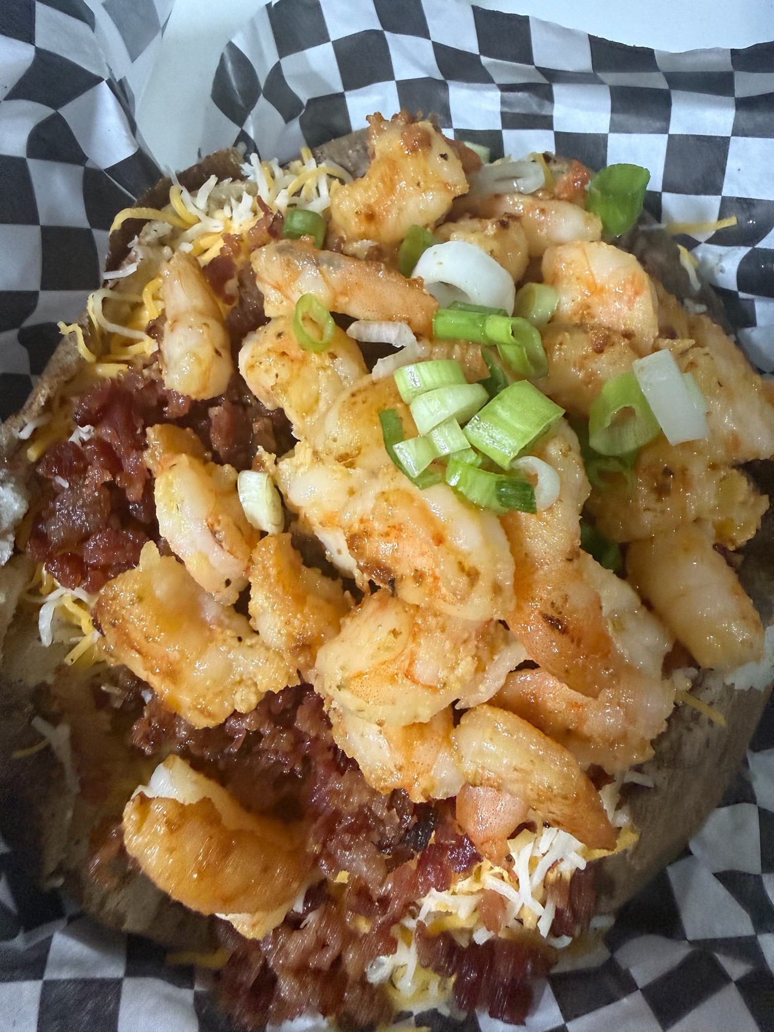 Placeholder photo of a loaded potato with extra toppings