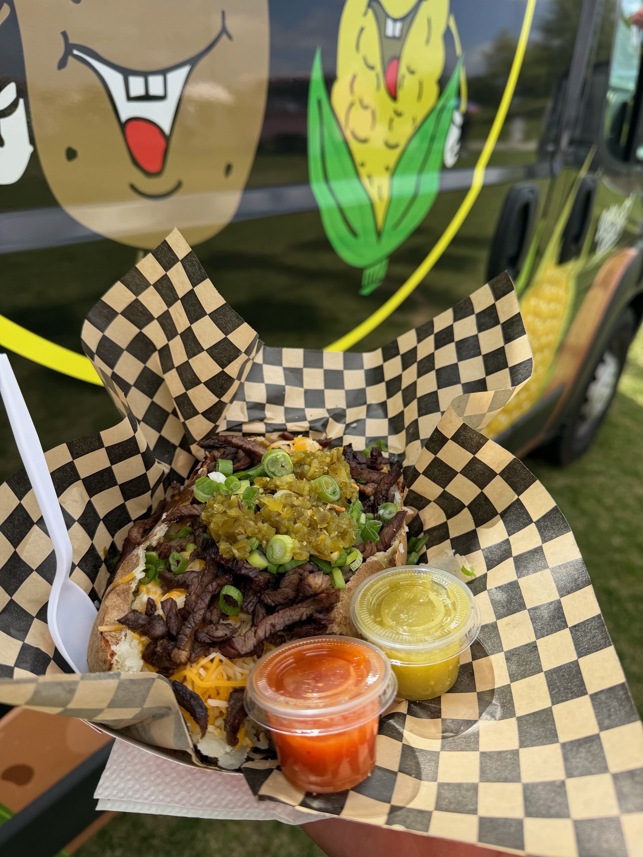 Placeholder photo of a loaded potato with extra toppings